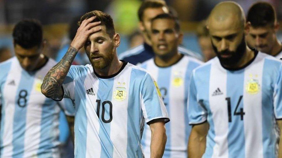 Argentina players react following their draw against Peru