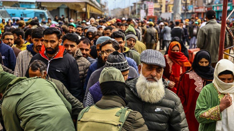 Security personnel are searching and frisking individuals before they attend Prime Minister Narendra Modi's rally amid tight security near Bakshi Stadium in Srinagar, Jammu and Kashmir, India, on March 7, 2024.