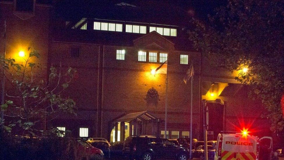 HMP Bedford with a police van outside