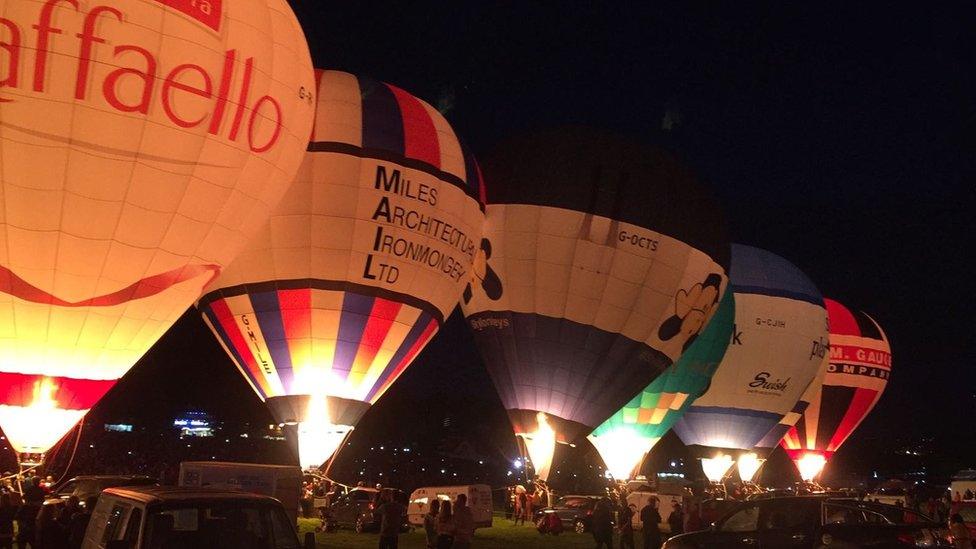 Line of lit up balloons