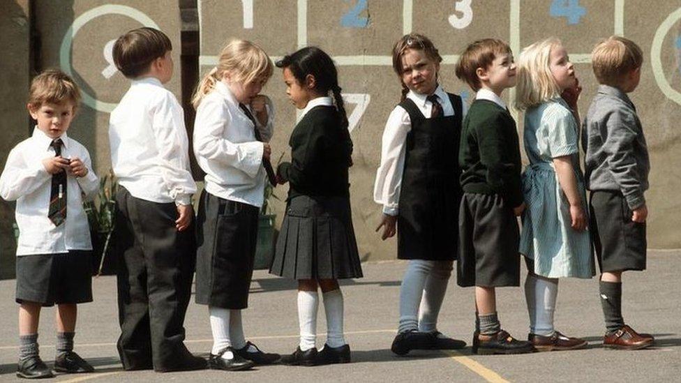 Children in school uniforms