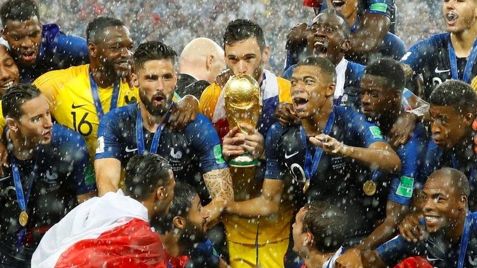 Hugo Lloris holding World Cup