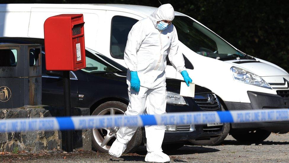 Forensic investigator examines scene on 4 September