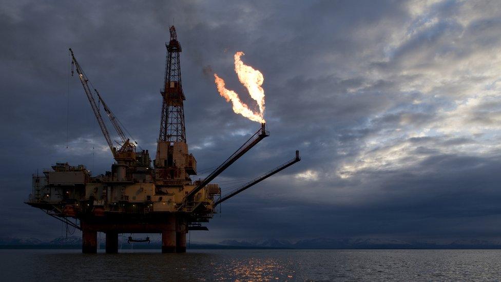 A natural gas flare from an offshore oil drilling rig in Alaska.