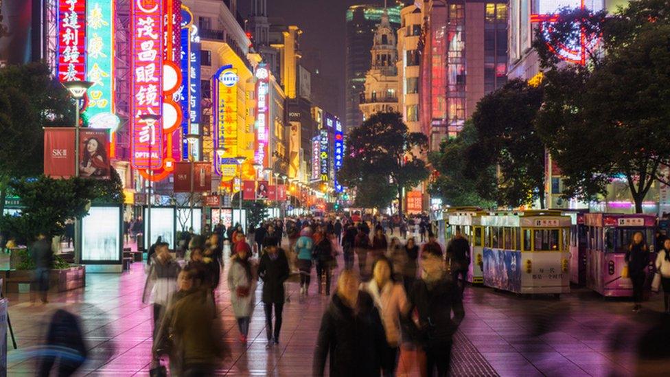 People on a crossing in china, blurred image