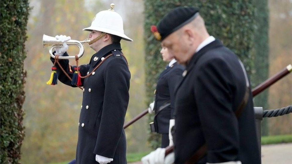 Dignitaries gather to pay respect to service members who fought in the two World Wars and subsequent conflicts at the National Memorial Arboretum amid the coronavirus pandemic in Stafford, Britain November 8, 202