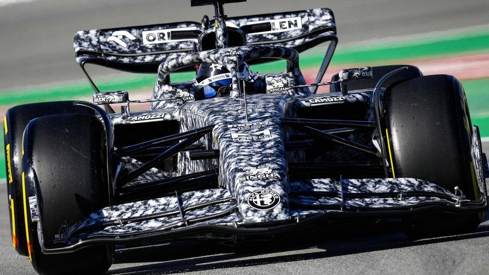 Finnish Formula One driver Valteri Bottas of Alfa Romeo steers the new C42 car sporting a special camouflage design