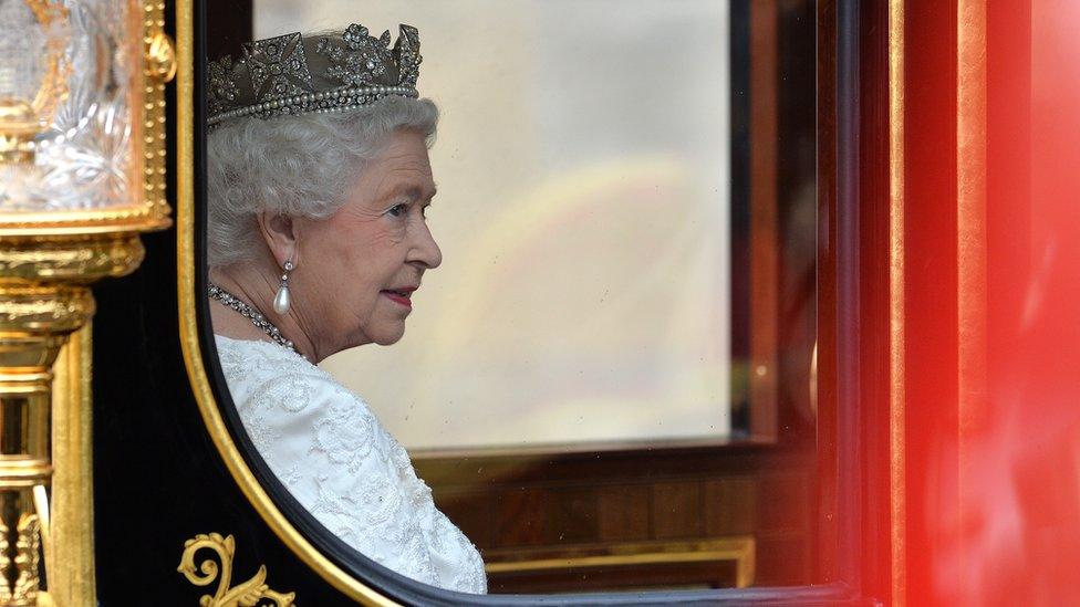 The Queen in a royal carriage