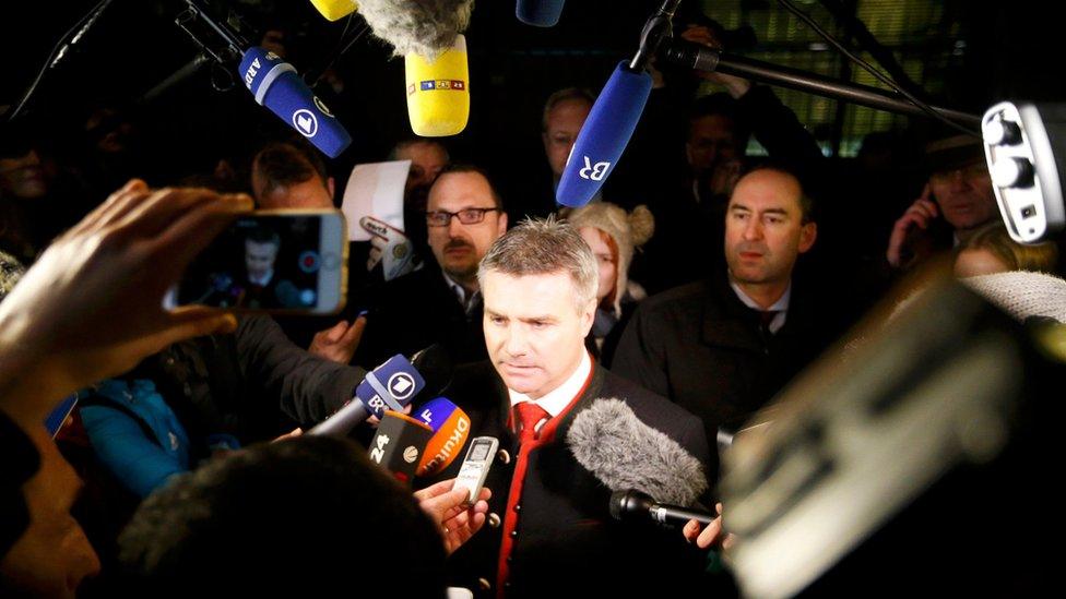 Landshut mayor Peter Dreier speaking to media outside Chancellor Merkel's office (14 January)