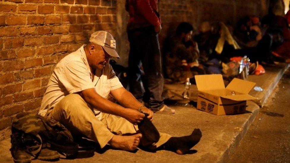 Migrants from Honduras rest outside a migrant shelter at full capacity in Guatemala City, Guatemala January 16, 2019.