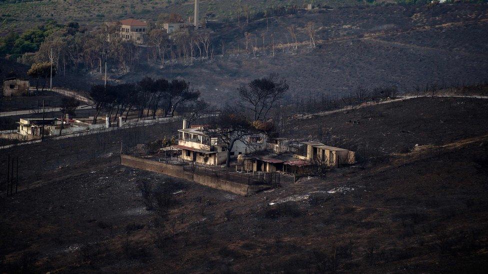 Burnt house in Neos Voutzas, Greece