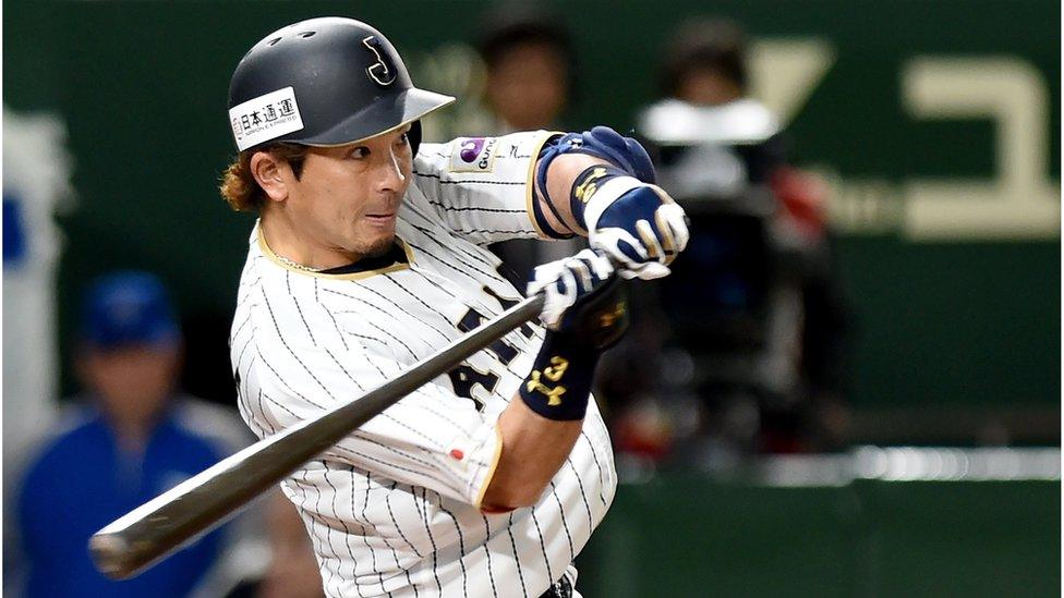 Japan's third baseman Nobuhiro Matsuda hits the ball during the World Baseball Classic match between Israel and Japan at Tokyo Dome in Tokyo, Japan on March 15, 2017.