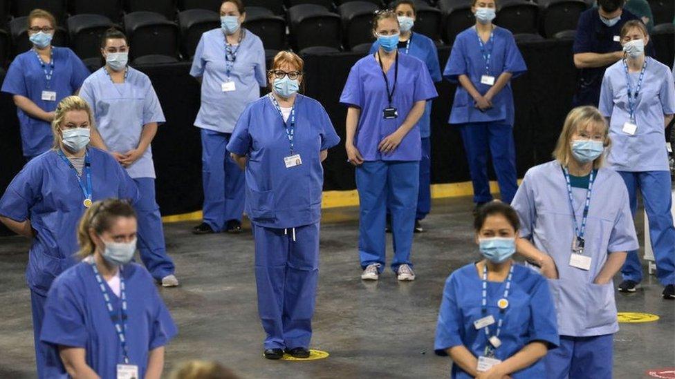 Health staff at the SSE Arena in Belfast on Monday