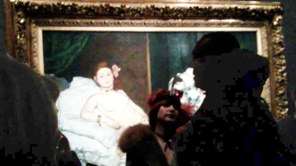 Deborah de Robertis in front of Edouard Manet's Olympia (Jan 2016)