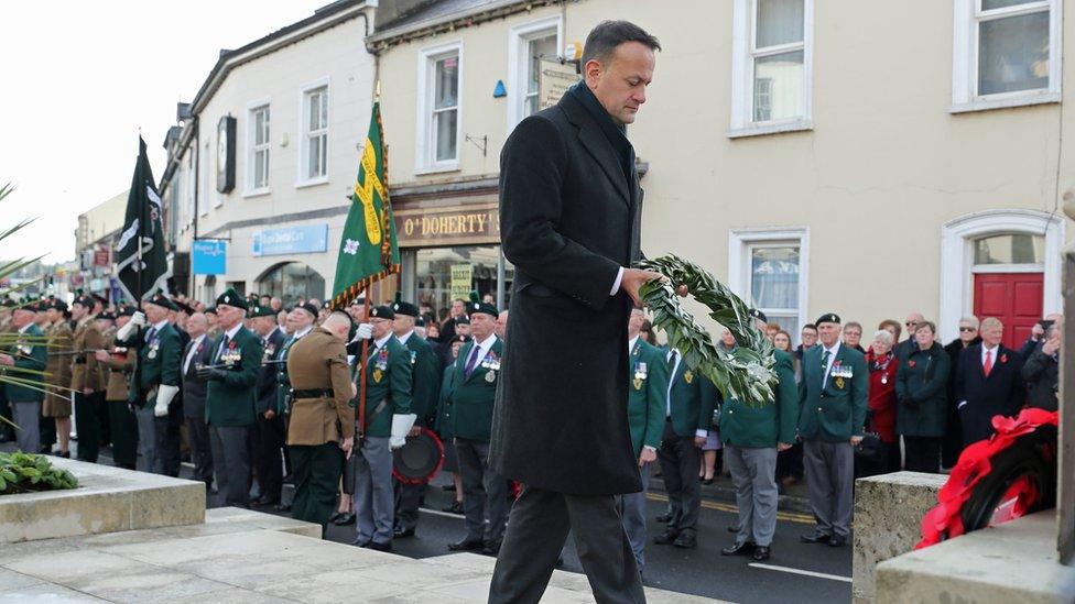 Taoiseach Leo Varadkar holds a wreath