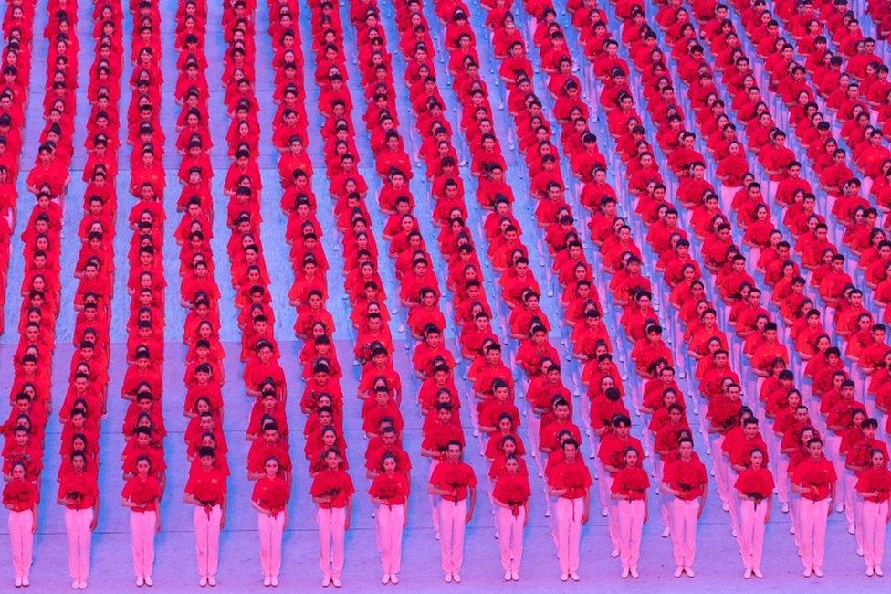 Performers take part in a show commemorating the 100th anniversary of the founding of the Communist Party of China at the National Stadium in Beijing, China, on 28 June 2021