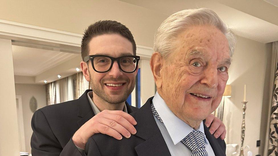 Alex and George Soros.