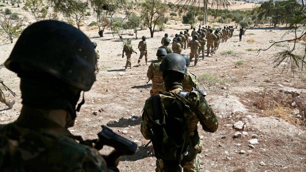 Rebel fighters prepare for an attack by the Syrian government on Idlib province, on 3 September, 2018