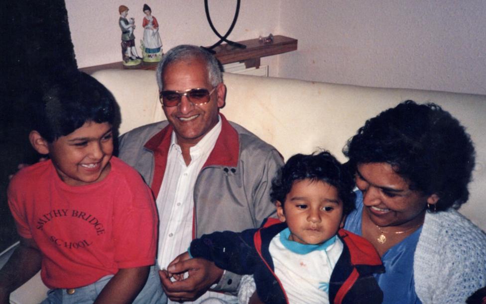 A young Shamal Waraich in his mother's arms