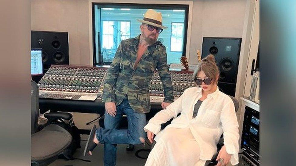 Dave Stewart and Faye Fantarrow in a music studio