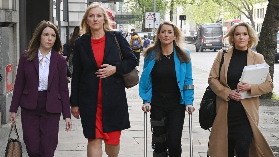 (L-R) Annita McVeigh, Martine Croxall, Karin Giannone and Kasia Madera, walk along Kingsway as they arrive for employment tribunal.