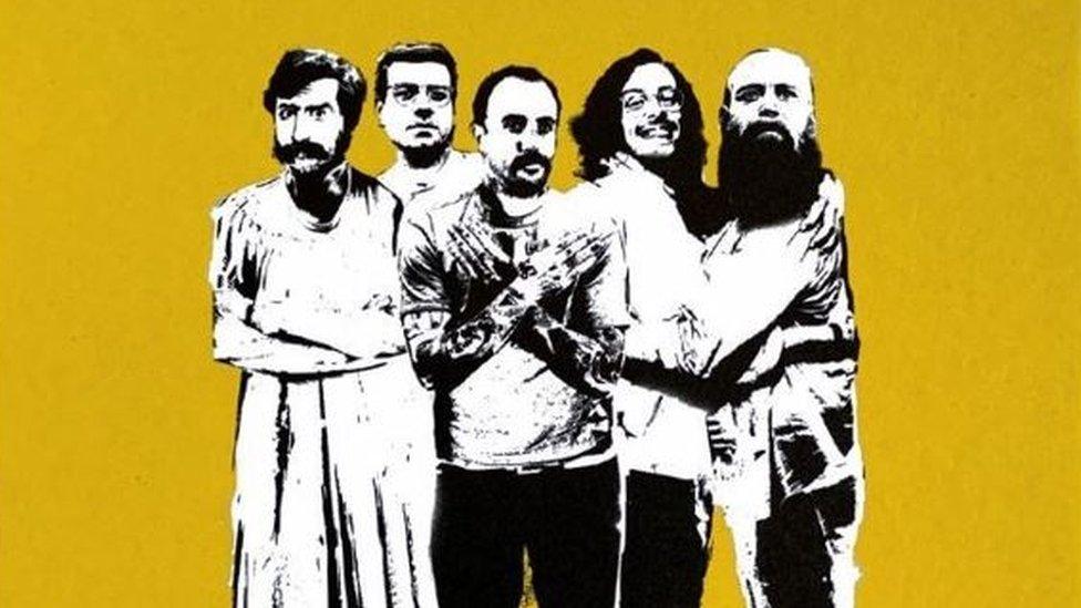 An artwork with black and white figures on a yellow background