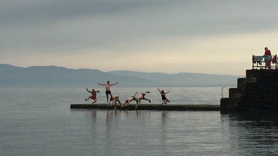 Francis McClave captured these people cooling off in Criccieth, Gwynedd