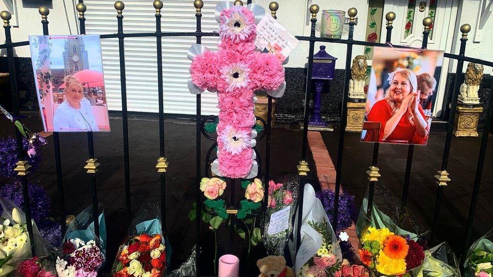 Flowers and tributes outside the bakery