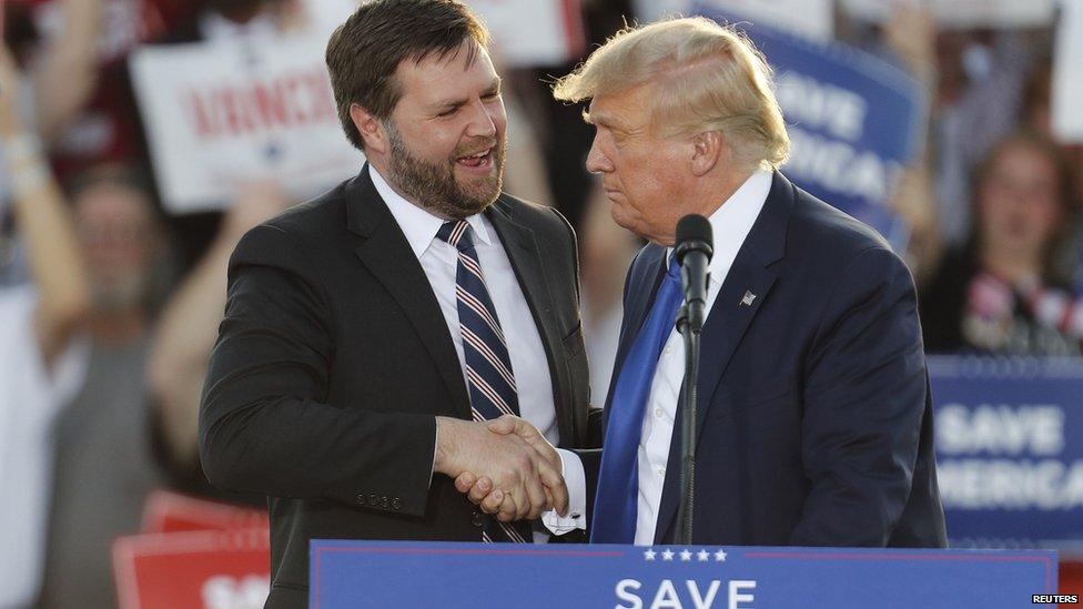 JD Vance and Donald Trump shake hands