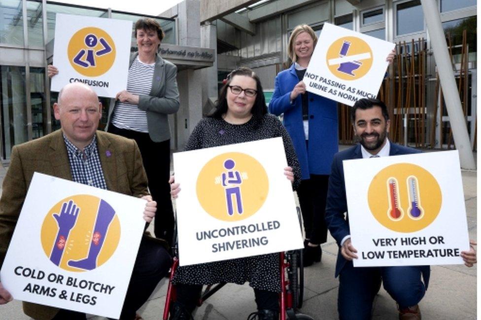 Sarah Weatherston, a teacher and sepsis survivor, and Fiona Griffith, GenOMICC Project manager, and (front, left to right) Colin Graham, Sepsis Research FEAT Chief Operating Officer, sepsis survivor Kimberley Bradley, and Scottish Health Secretary, Humza Yousaf, at the launch of the new national sepsis awareness campaign