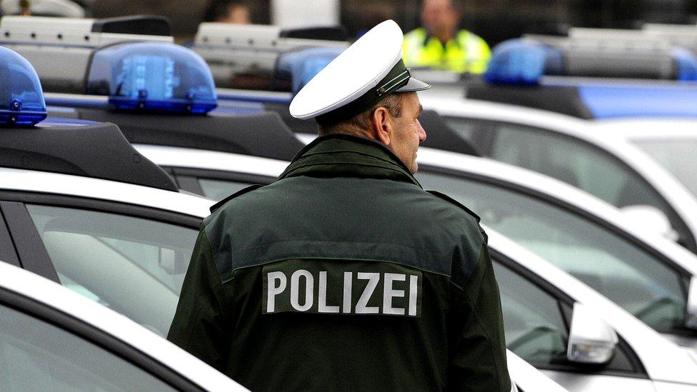 A German police officer in the eastern German city of Dresden, 16 December 2008