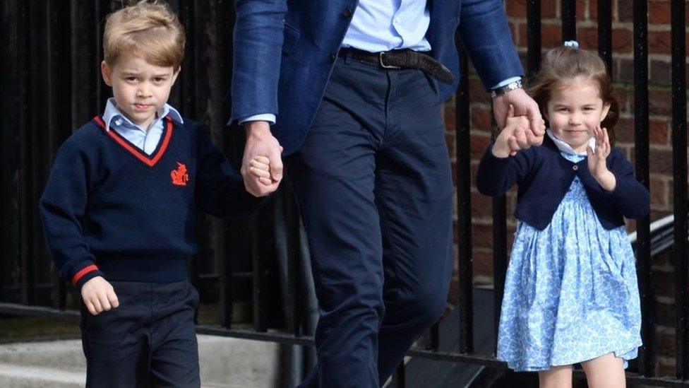 Princess Charlotte waves to the crowds and press outside the hospital