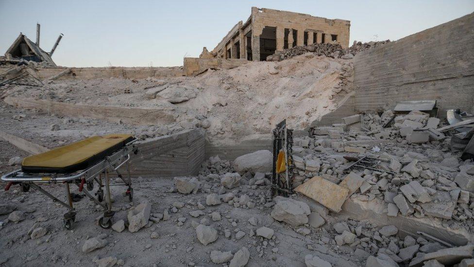 A picture taken on July 4, 2019 shows damage at the entrance of a hospital following a reported airstrike in Kafranbel