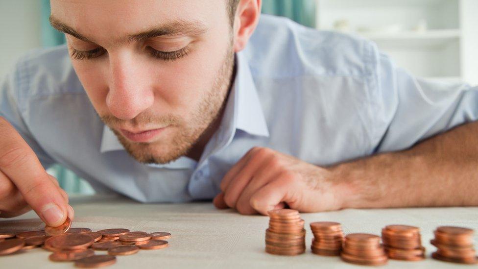 Man with coins