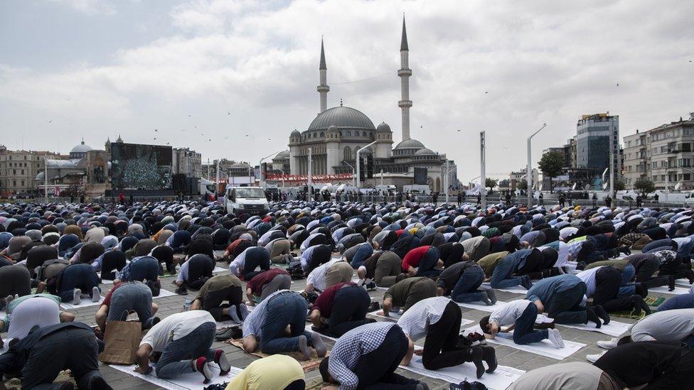 Worshippers outside Taksim Mosque