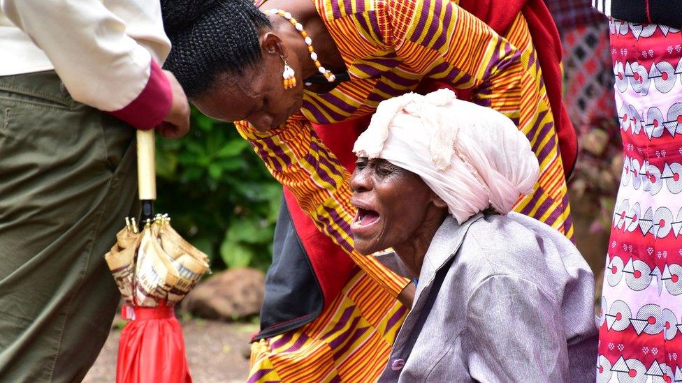 Residents grieve outside the Mawenzi hospital in northern Tanzania