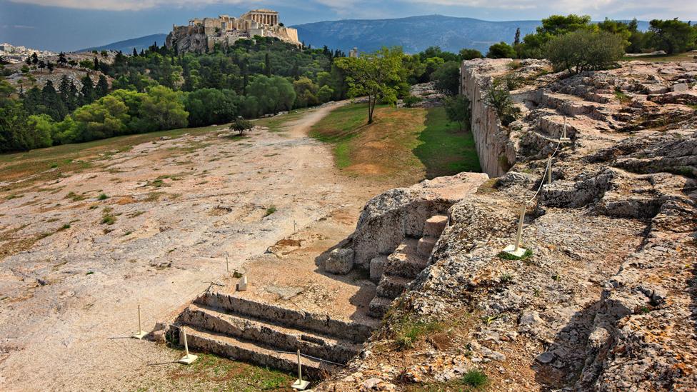 The "Bema" or "Vema" of Pnyx, where popular assemblies took place in Ancient Athens, Greece (looking across to the Acropolis)