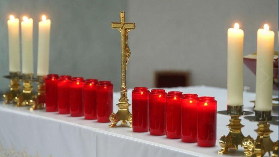 Ten candles, representing the victims of the explosion, have been sitting on the alter in St Michael's Church all week