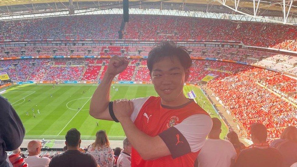 Fumiaki Sukemune wearing a Luton shirt in Wembley for the play-off final