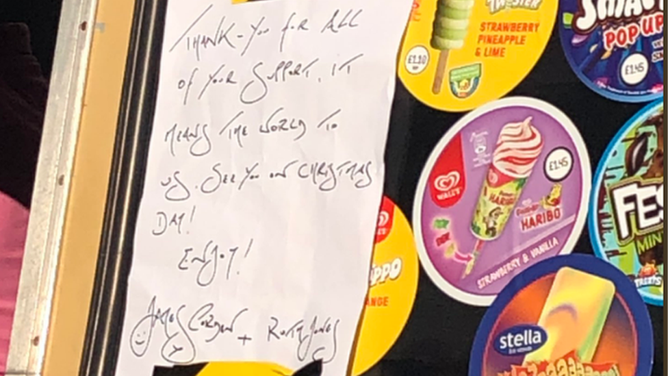 A picture of the note pinned to the ice cream van