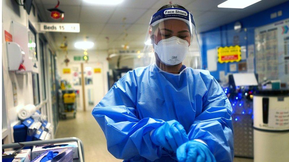 A medical worker wearing PPE at King's College Hospital, London