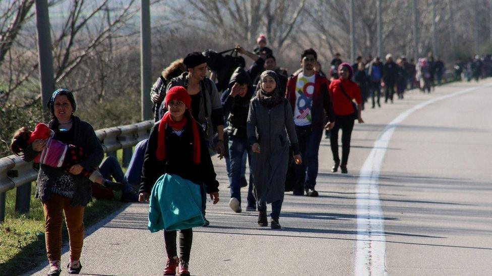 Migrants and refugees approach the Macedonian border with Greece (22 Feb)