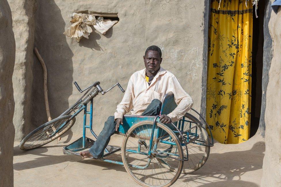 Soumaila Soumana outside his home in Norandé