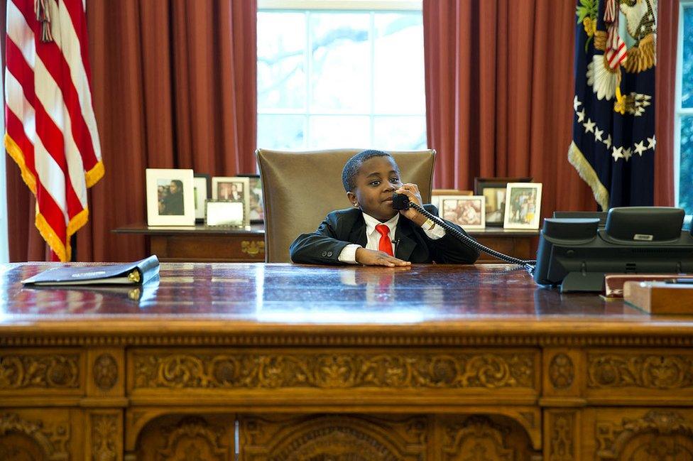 Kid President feigns a phone call in the Oval Office