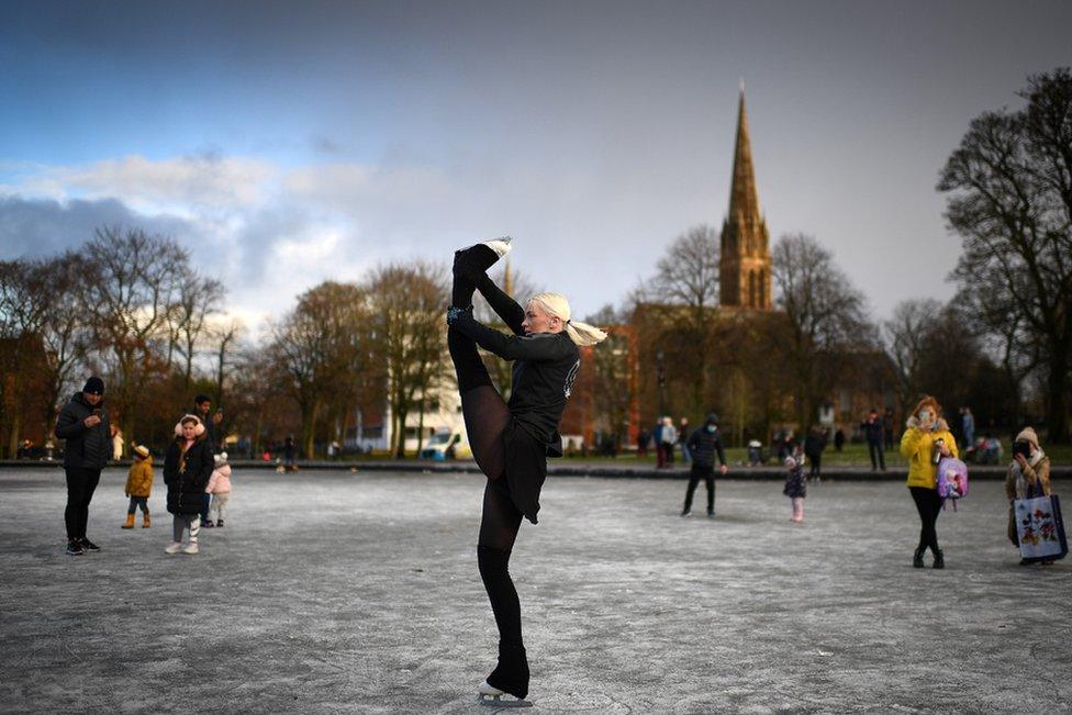 Skater Suzie Murray skates a Queens Park pond in Glasgow, Scotland.