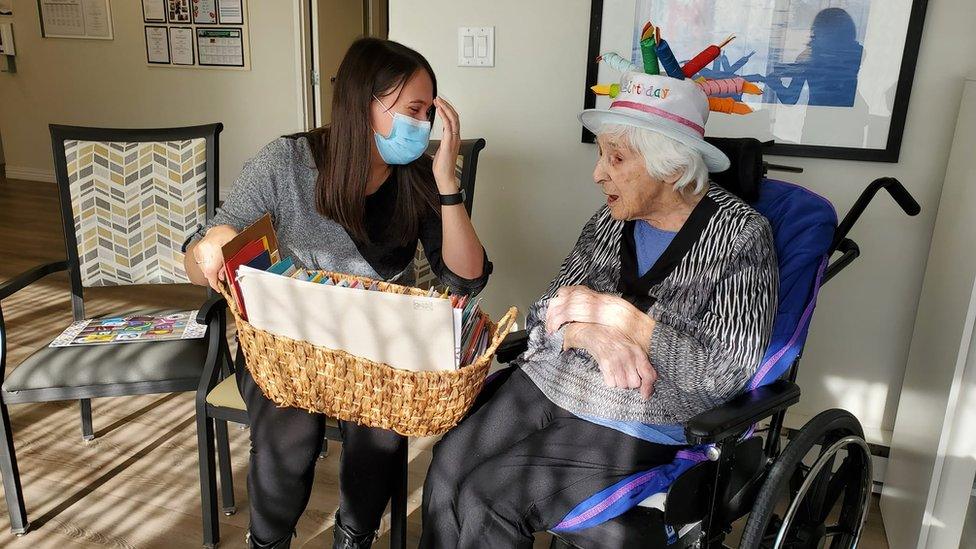 Women with a basket of birthday cards