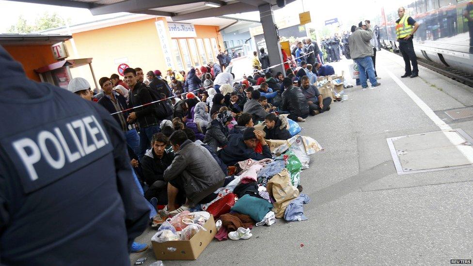 Migrants at a border train station in Germany