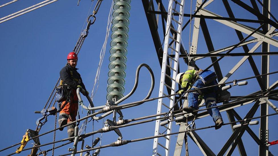 Men working on pylon