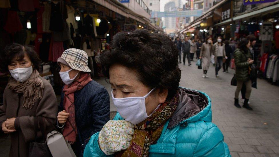 Elderly people wearing face masks