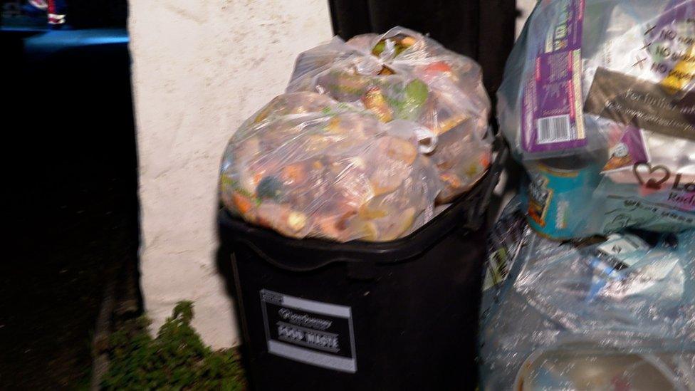 Guernsey food waste container overflowing and recycling bag